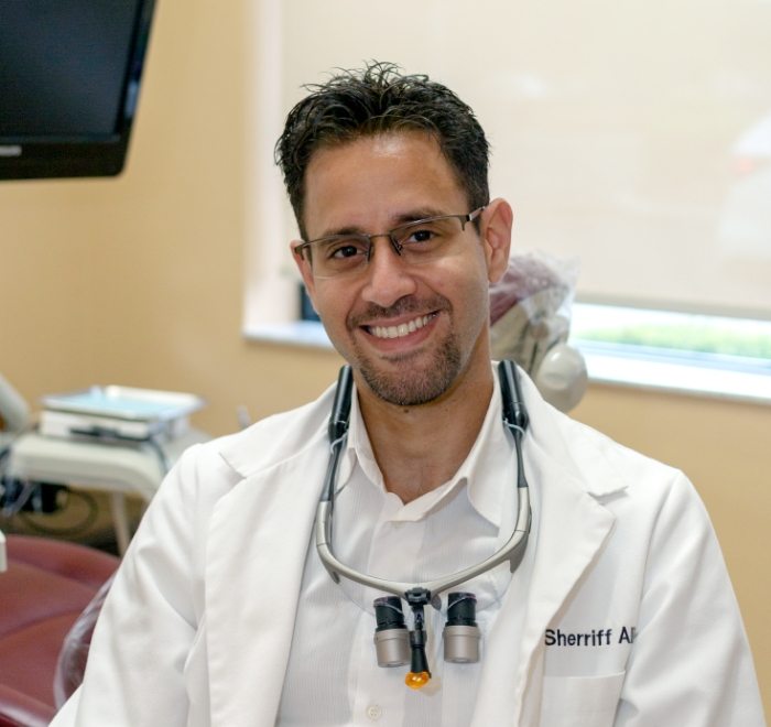 Wesley Chapel Florida dentist Doctor Sherriff Ali smiling