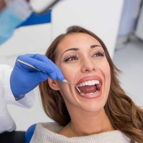 Woman receiving a dental checkup