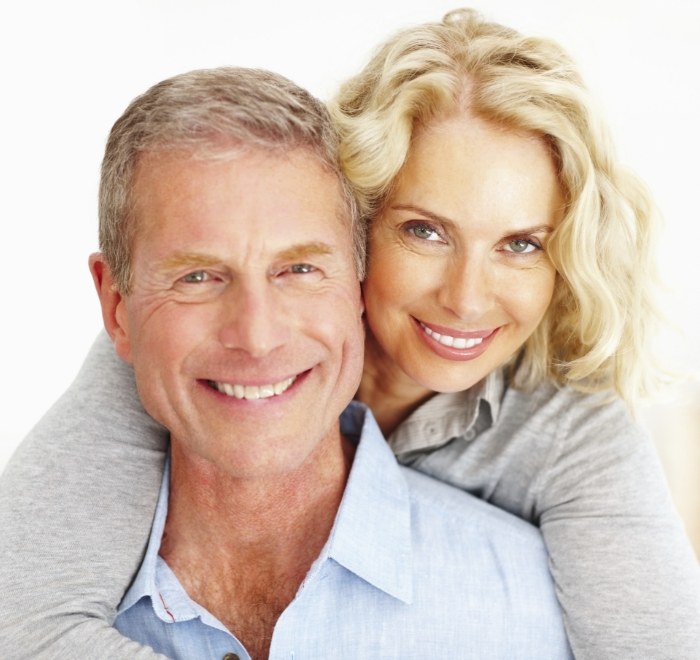 Senior man and woman smiling after restorative dentistry in Wesley Chapel